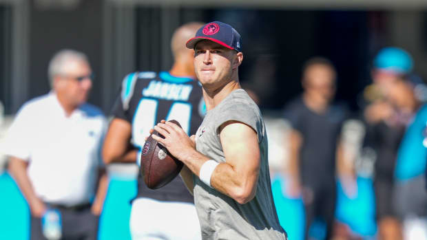 Texans quarterback Davis Mills during warmups against the Carolina Panthers at Bank of America Stadium.